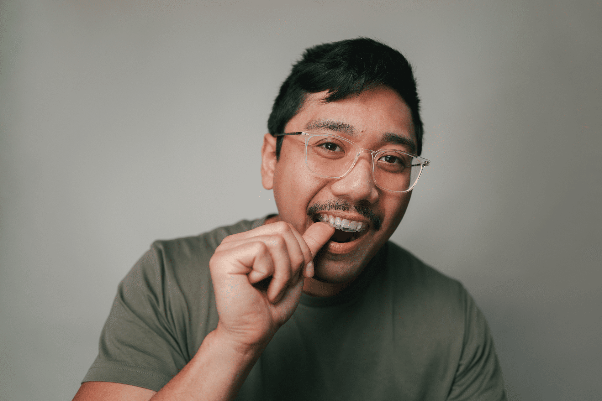 Adult wearing clear aligners for shifting teeth after 40 in Downey, CA